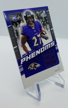 Load image into Gallery viewer, Side view of the 2020 Donruss Rookie Phenoms J.K. Dobbins Baltimore Ravens Rookie Patch Football Card
