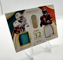 Load image into Gallery viewer, 2018 Immaculate Kenyan Drake &amp; Mark Walton Dual Patch Football Card 24/50
